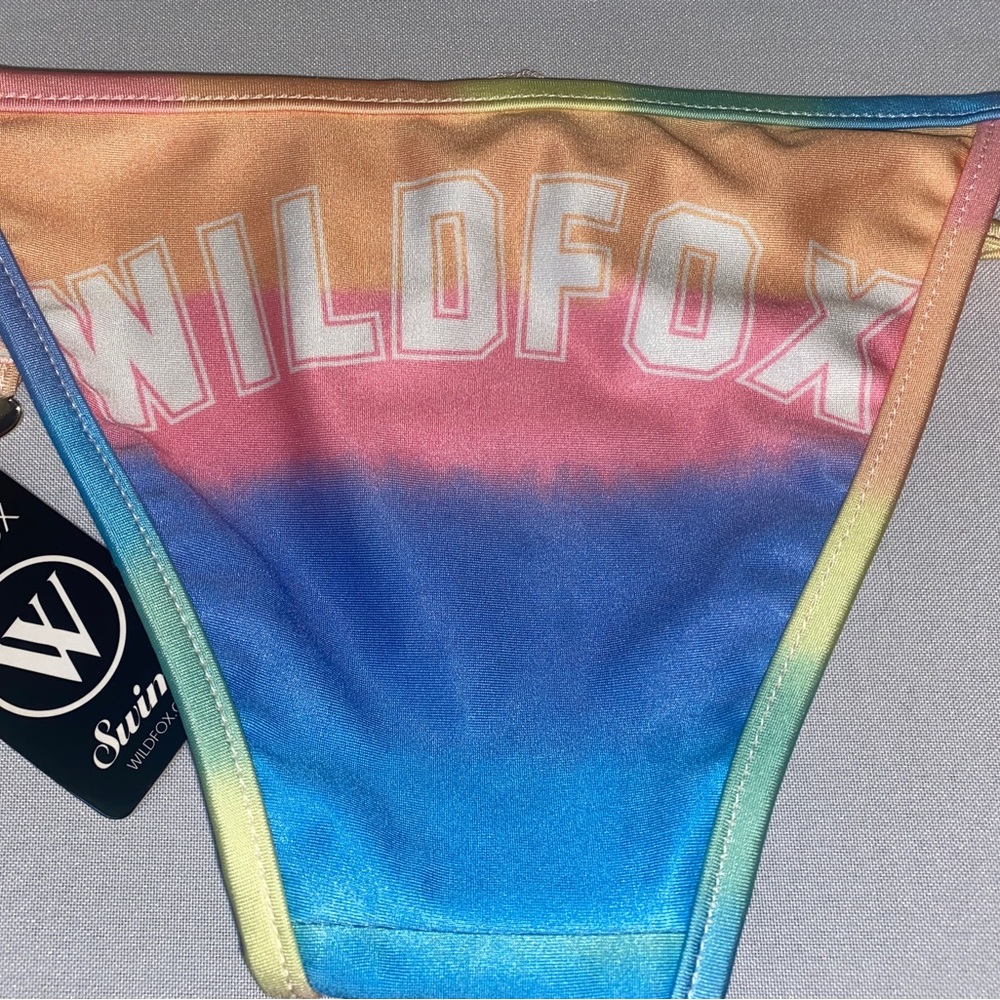 Wildfox spell out on back. Wildfox Swimsuit Bottom New XS Rainbow